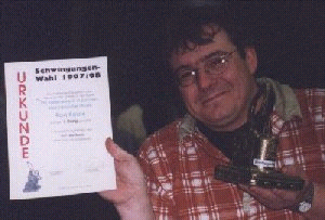 Ron Boots receives an Electronic Music award in April, 1998.